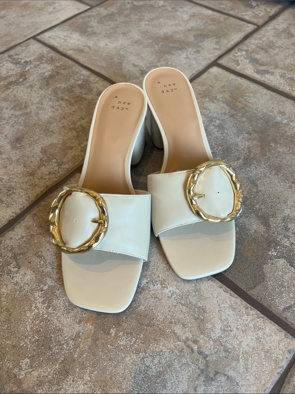A New Day  Cream Slide Mules with Gold buckle. Adjustable. Worn once.